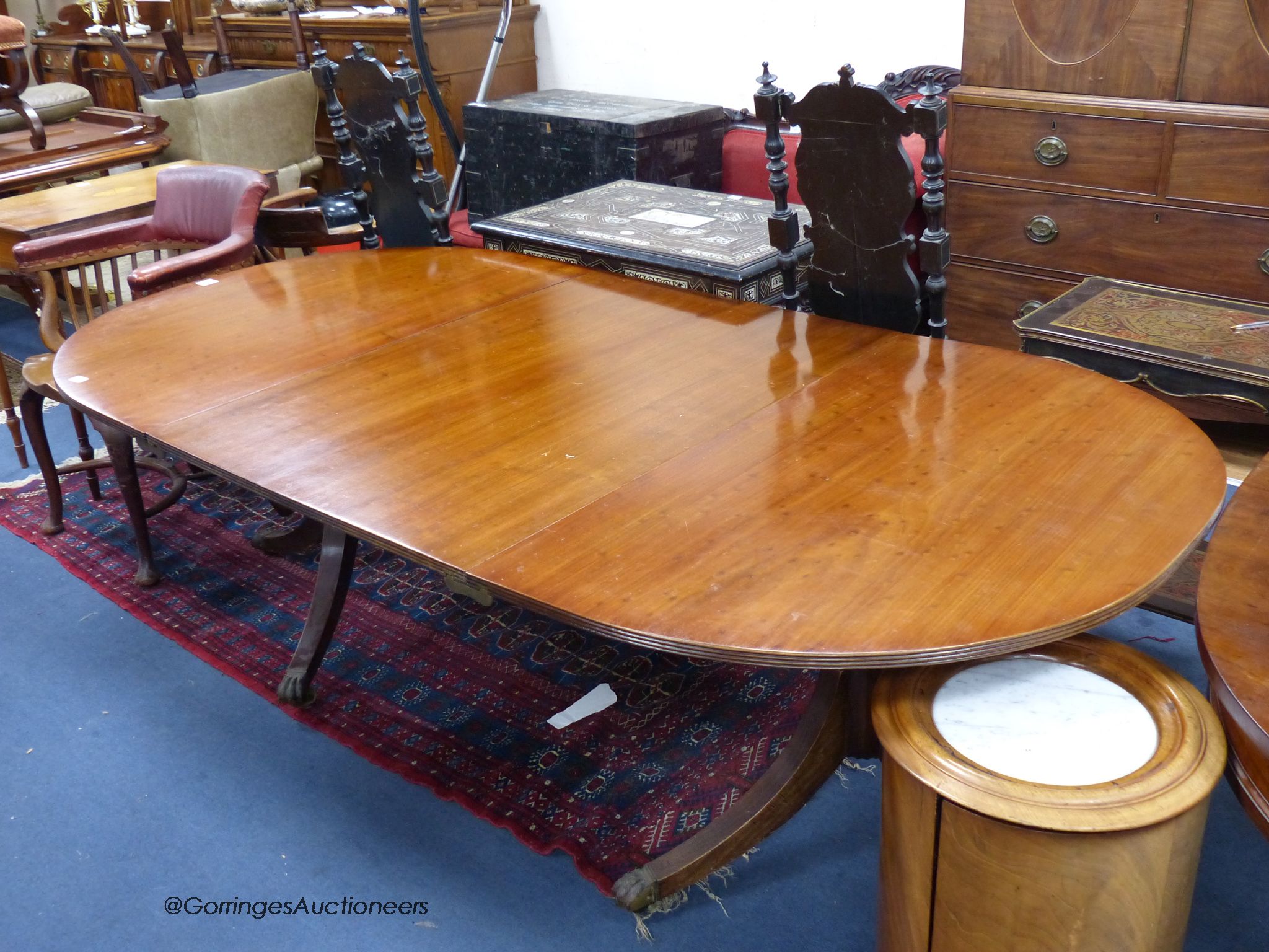 A Georgian style twin pillar dining table. W-215cm extended. D-111, H-69cm.